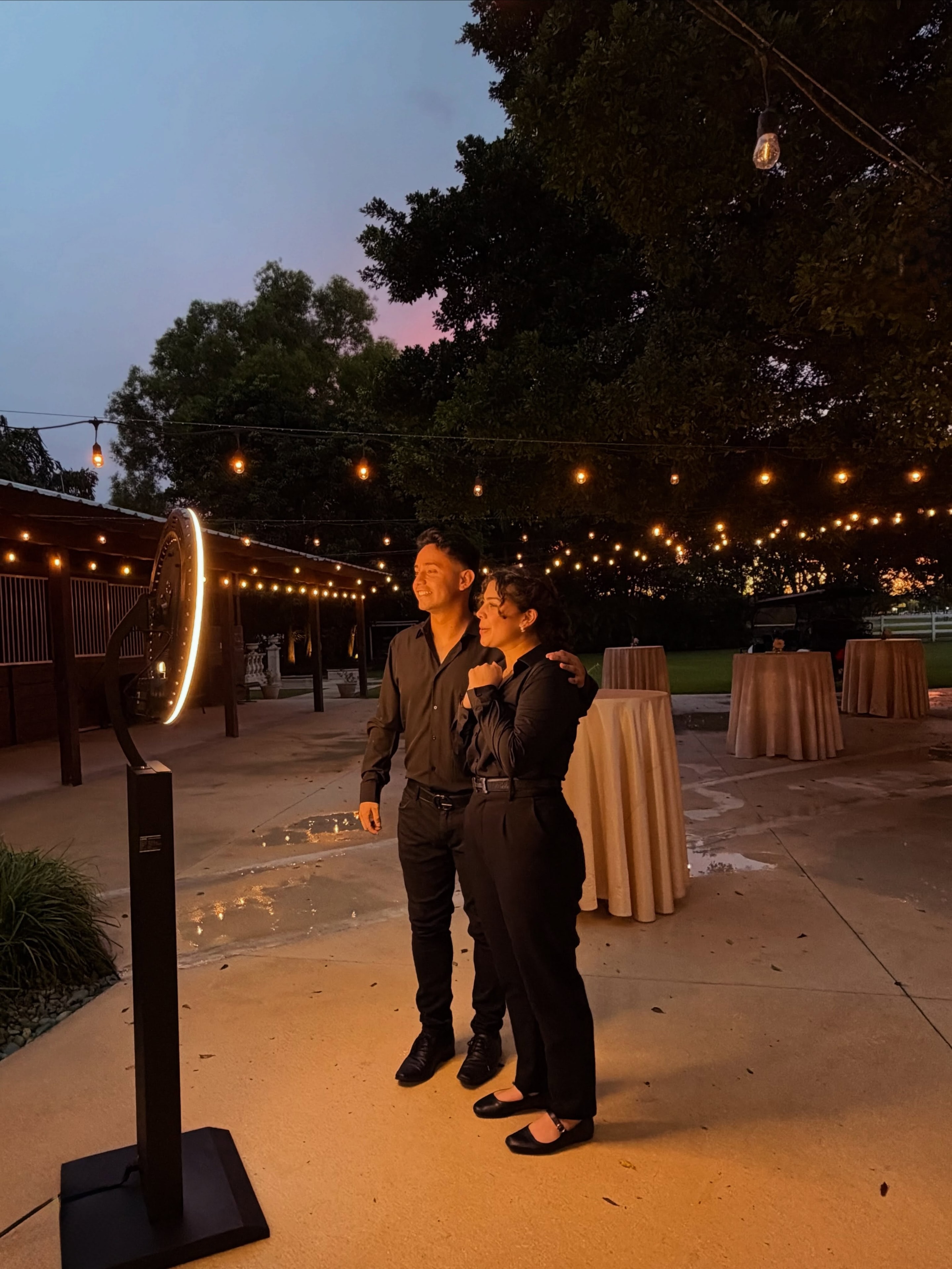 Elegant outdoor wedding reception with The Giggle Booth photo booth